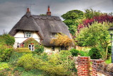 Desenhos de Pretty Thatched Cottage Jigsaw Puzzle para colorir