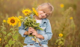 Young Girl with Sunflowers Jigsaw Puzzle